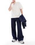 [ASOS DESIGN] ASOS DESIGN super baggy jeans with back pocket details in raw wash-Blue W30 L32 Indigo