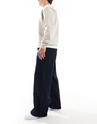 ASOS DESIGN super baggy jeans with double front pocket detail in light wash blue