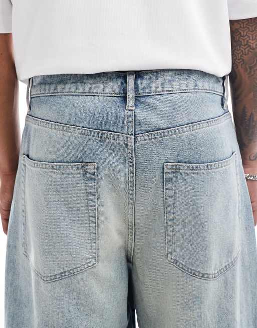 ASOS DESIGN super baggy jeans with frayed hems in vintage