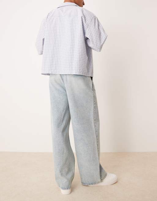 ASOS DESIGN super baggy jeans with front pleats in light wash blue