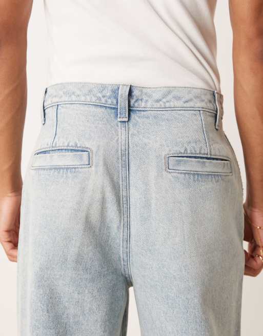 ASOS DESIGN super baggy jeans with front pleats in light wash blue