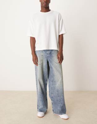 super baggy jeans with oversized back pockets in dirty blue tint