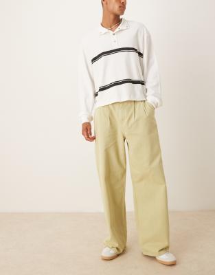 Asos Design Super Baggy Jeans With Pleats In Yellow