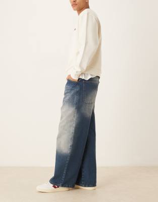 Asos Design Super Baggy Jeans With Raw Edge In Blue