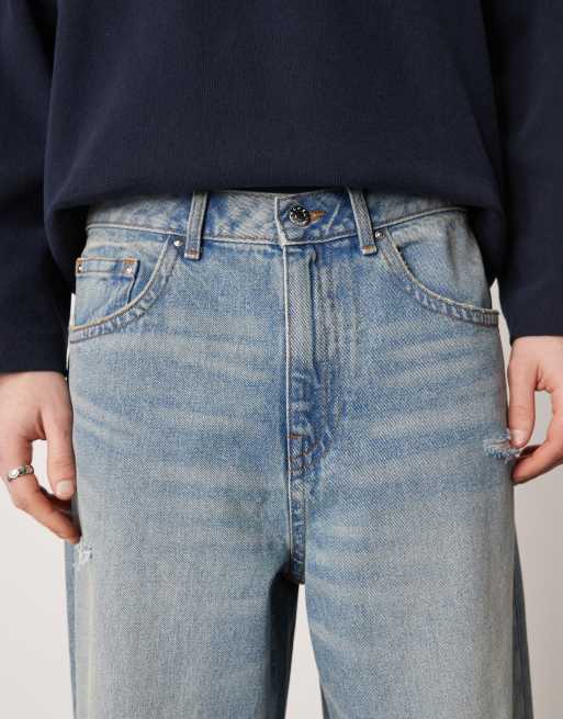 ASOS DESIGN super baggy jeans with rips in vintage light wash blue