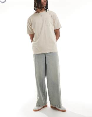 super baggy jeans with side panel in yellow tint light wash blue