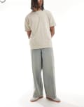 [ASOS DESIGN] ASOS DESIGN super baggy jeans with side panel in yellow tint light wash blue W38 L34 Light wash blue