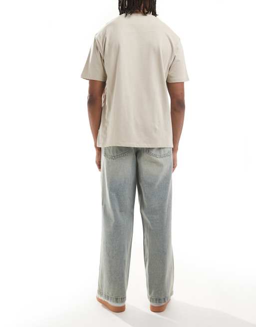 ASOS DESIGN super baggy jeans with side panel in yellow tint light wash blue