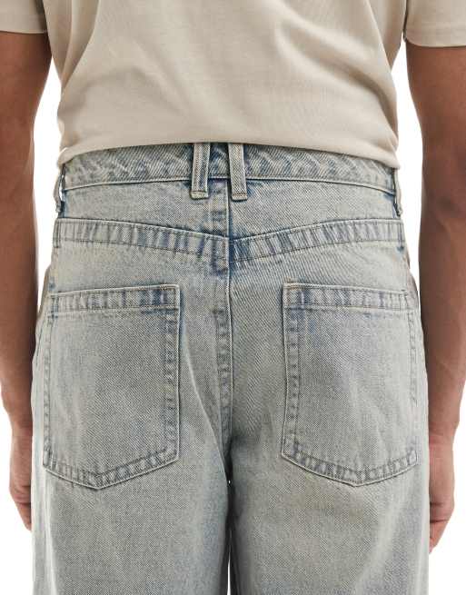 ASOS DESIGN super baggy jeans with side panel in yellow tint light wash blue