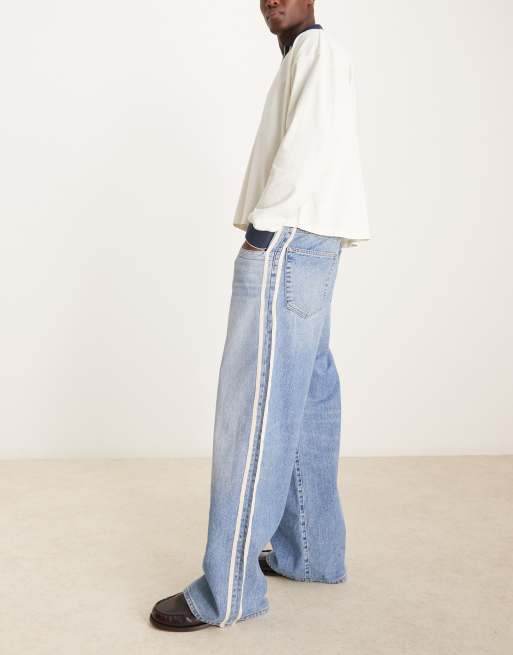 ASOS DESIGN super baggy jeans with side stripe in mid blue wash ASOS