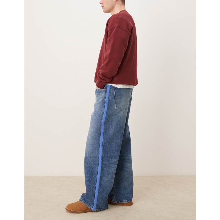 ASOS DESIGN super baggy jeans with side stripe in mid wash