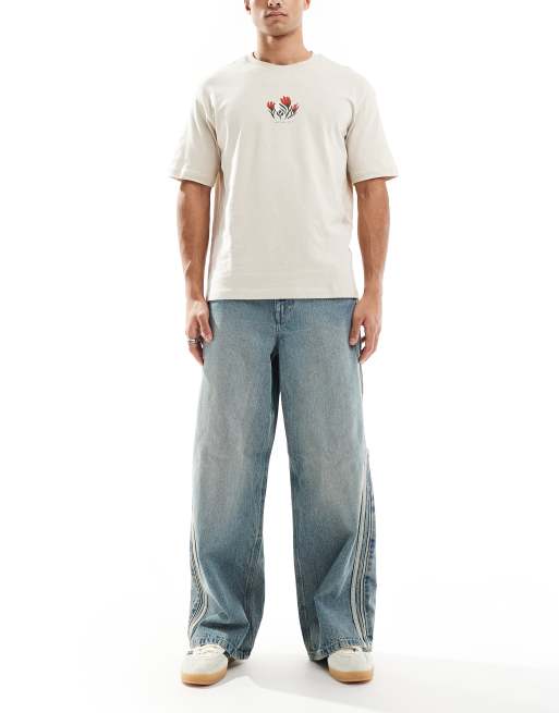 ASOS DESIGN super baggy jeans with sporty detail in mid wash blue 