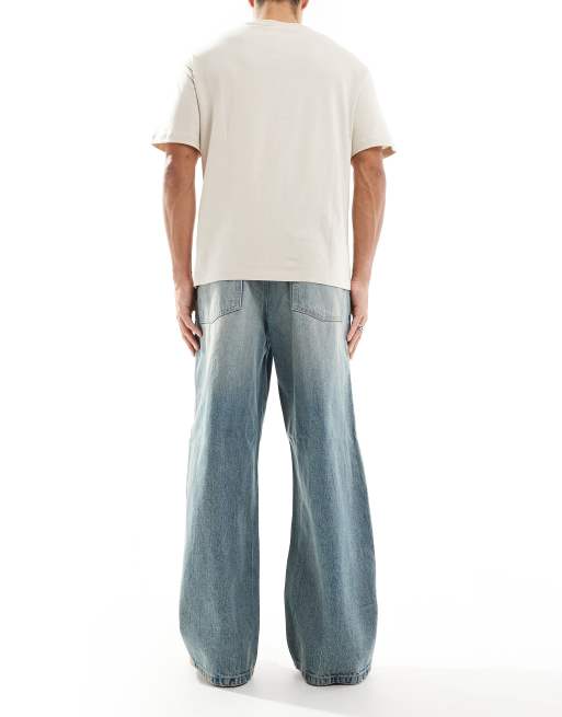 ASOS DESIGN super baggy jeans with sporty detail in mid wash blue 