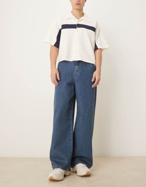 ASOS DESIGN super baggy jeans with twisted seams in mid wash blue - view 1