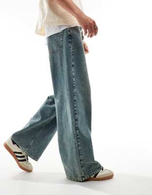 ASOS DESIGN super baggy jeans with vintage green tint