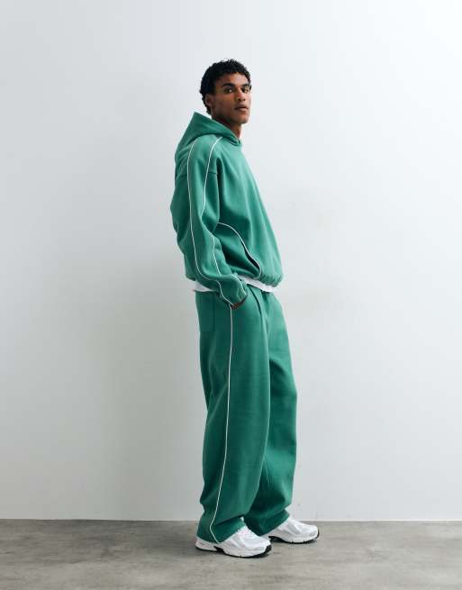 ASOS DESIGN super baggy joggerset med piping i grönt, 2 av 5