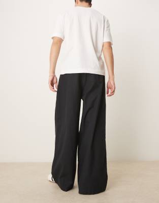 ASOS DESIGN – Superweite Hose aus Leinen-Mix in Schwarz