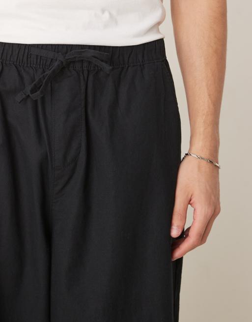 ASOS DESIGN – Superweite Hose aus Leinen-Mix in Schwarz