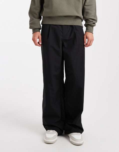 ASOS DESIGN super baggy pants in black nylon with pleats - view 1