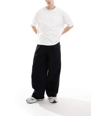 ASOS DESIGN super baggy pants in black with pleat detailing