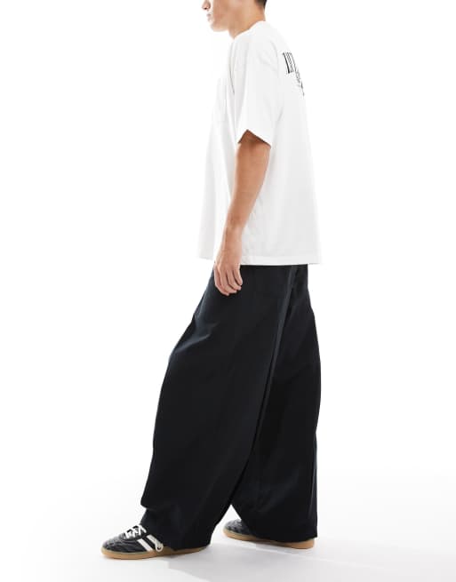 ASOS DESIGN super baggy pants in black with pleat detailing