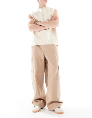 ASOS DESIGN super baggy pull on cargo pants in beige - view 1