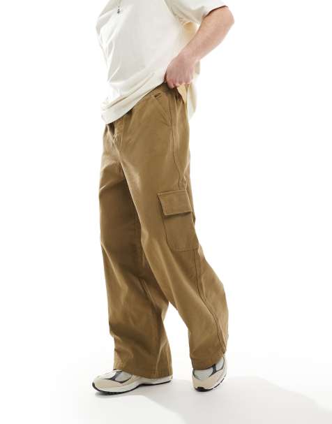 ASOS DESIGN super baggy pull on cargo pants in tan - view 1