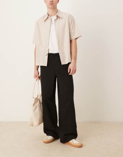 ASOS DESIGN super baggy pull on fatigue pants with darts in black - view 1
