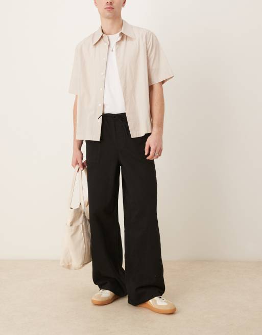 ASOS DESIGN super baggy pull on fatigue pants with darts in black