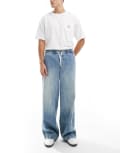 [ASOS DESIGN] ASOS DESIGN super baggy pull on jeans in light wash blue S Light wash blue