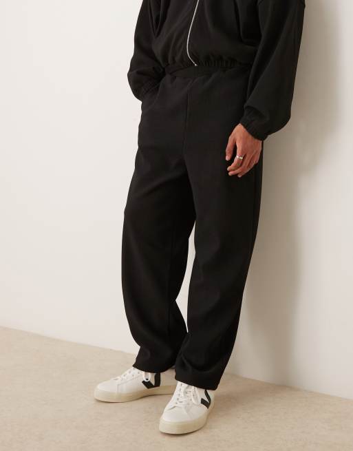 ASOS DESIGN super baggy ribbed sweatpants in black - part of a set