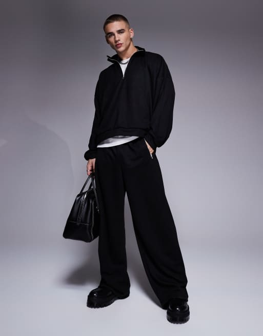 ASOS DESIGN super baggy scuba trackies with zip pockets in black (part of a set)