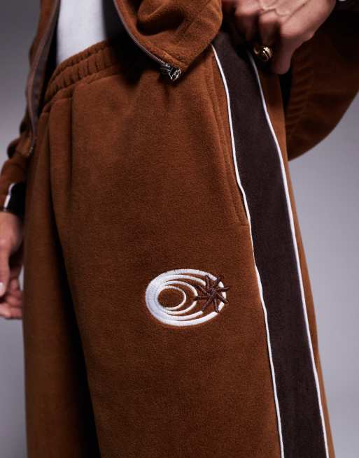 ASOS DESIGN super baggy trackies with panels in brown fleece (part of a set)
