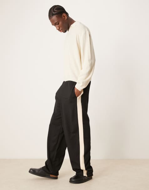 ASOS DESIGN super baggy sweatpants with taping in black - view 1