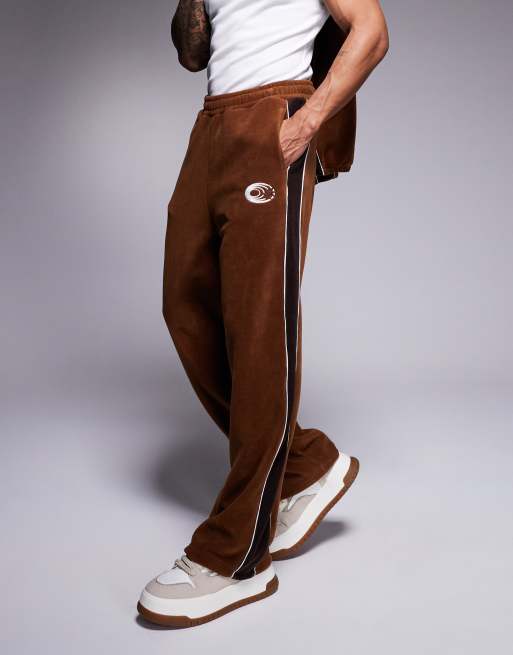 ASOS DESIGN super baggy trackies with panels in brown fleece (part of a set)