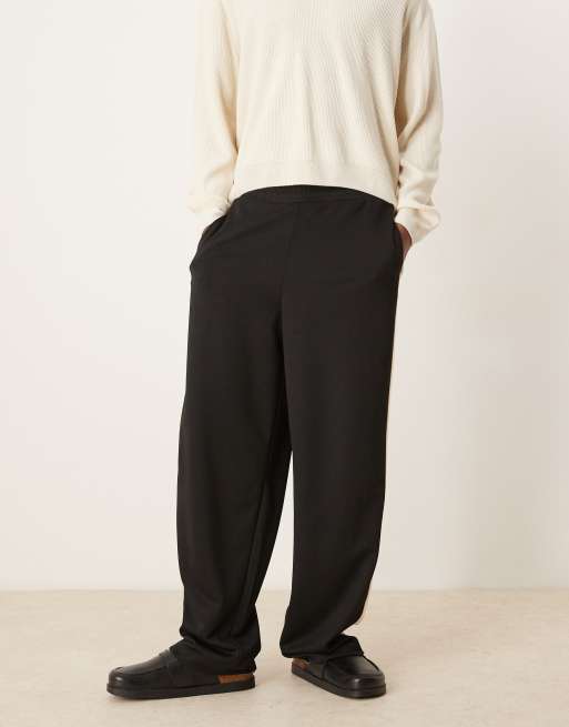 ASOS DESIGN super baggy trackies with taping in black