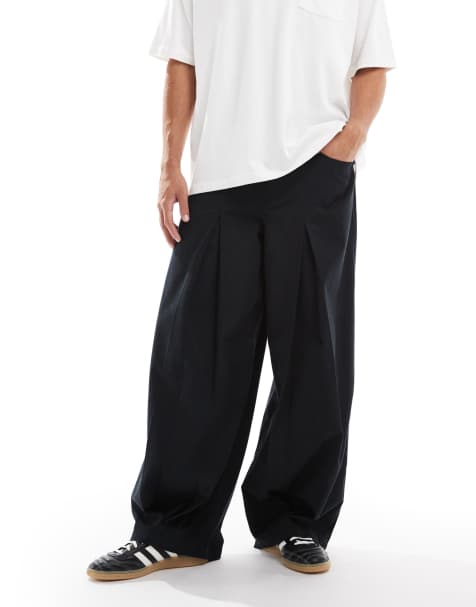 ASOS DESIGN super baggy trousers in black with pleat detailing - view 1