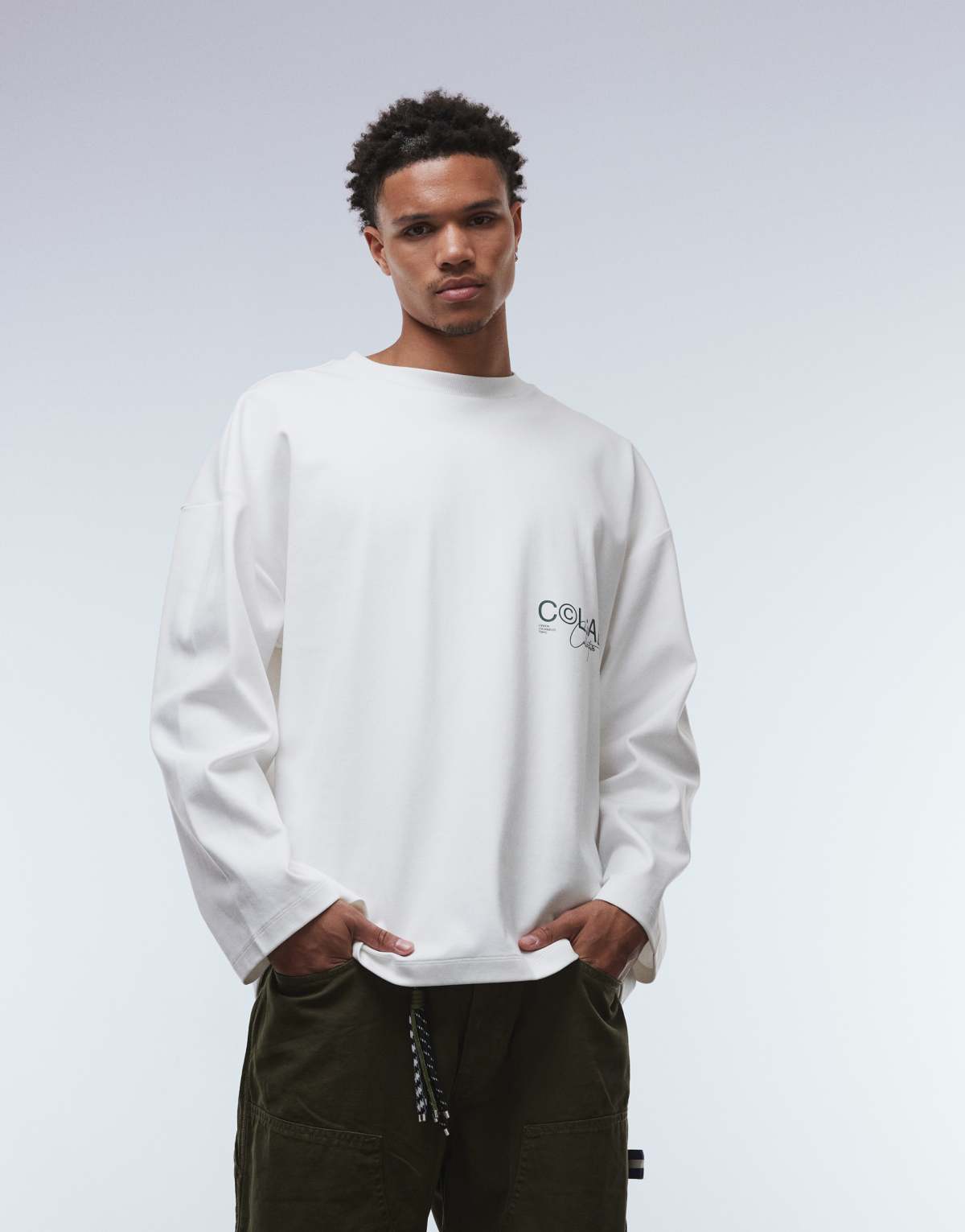 ASOS DESIGN super heavyweight premium oversized long sleeve t-shirt with dropped shoulder and text graphic in white