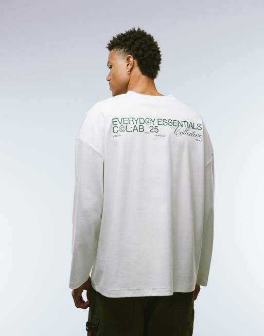 ASOS DESIGN super heavyweight premiumoversized long sleeve t-shirt with dropped shoulder and text graphic in white 