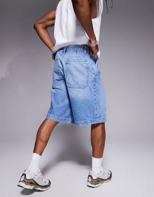 ASOS DESIGN super long length denim jorts in light wash blue