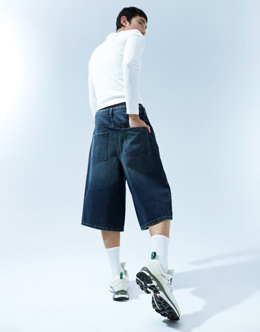 ASOS DESIGN super long length denim jorts with abrasions in