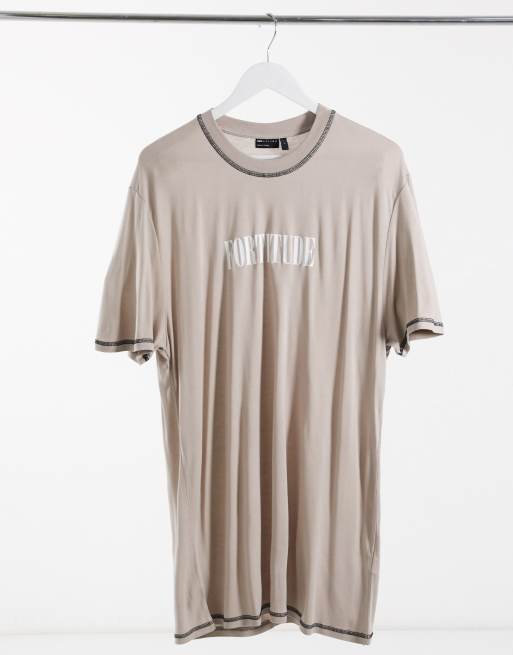 ASOS DESIGN super longline relaxed t shirt with central chest text print in washed viscose