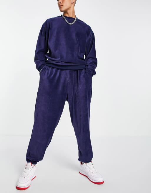 ASOS DESIGN – Super-Oversize-Jogginghose aus geripptem Velours in Marineblau, Kombiteil