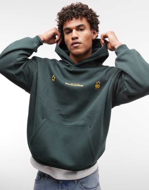 ASOS DESIGN – Super-Oversize-Kapuzenpullover in Grün mit Sterne-Print, 3 von 5