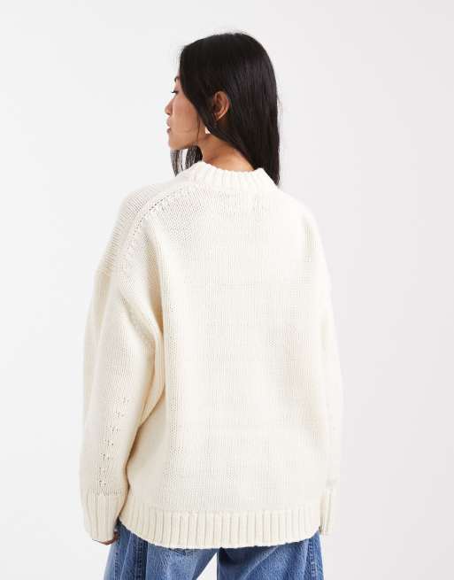 ASOS DESIGN oversized crew neck jumper with curved hem in clean yarn in cream
