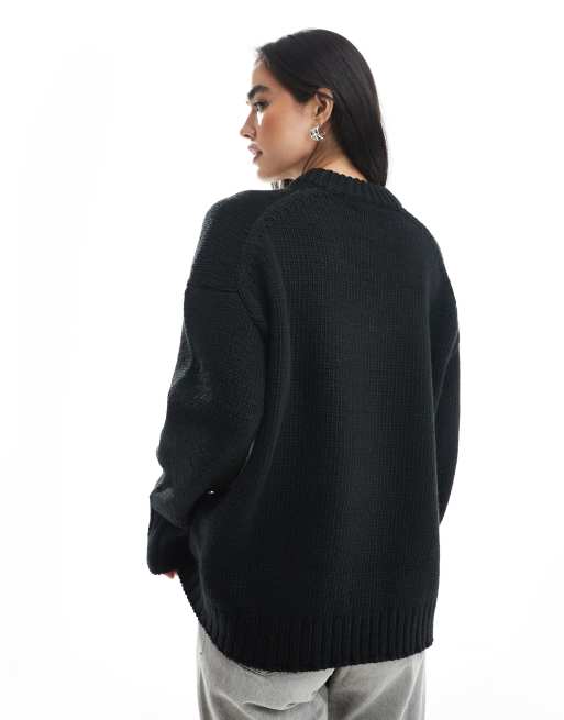 ASOS DESIGN super oversized chunky crew neck sweater with curved hem in black 