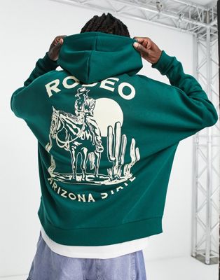 ASOS DESIGN super oversized hoodie in dark green with rodeo front and back print - ASOS Price Checker