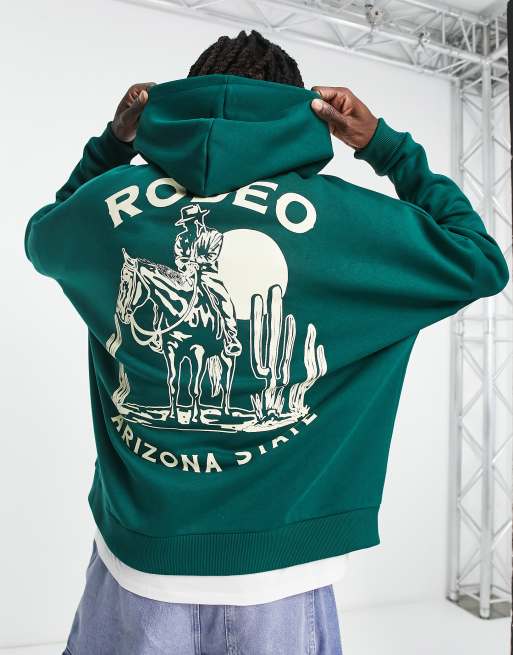 ASOS DESIGN super oversized hoodie in dark green with rodeo front and back  print | ASOS