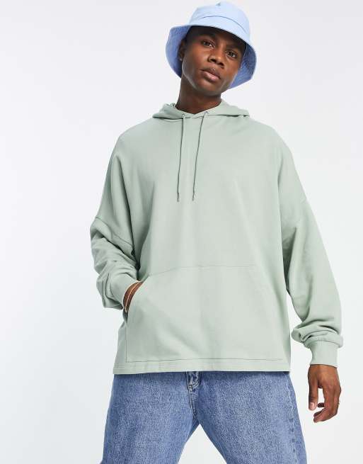 ASOS DESIGN super oversized hoodie in green with cartoon skate back print