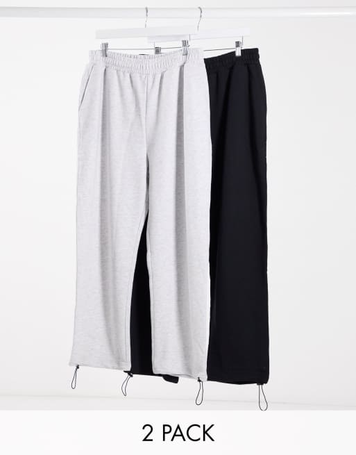 ASOS DESIGN super oversized joggers 2 pack in white marl/black with toggle hem